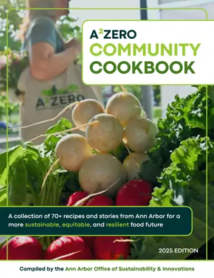 The cover of the A2ZERO Community Cookbook, which says "A2ZERO Community Cookbook: A collection of 70+ recipes and stories from Ann Arbor for a more sustainable, equitable, and resilient food future."